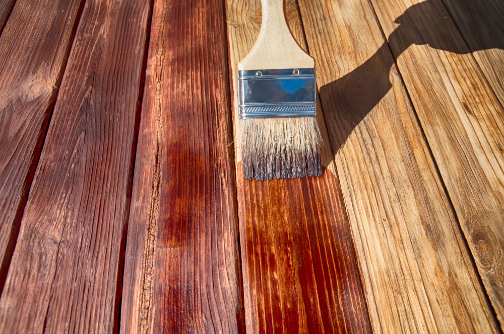 Professional deck painting and staining services in West Island Montreal - restored wood deck example
